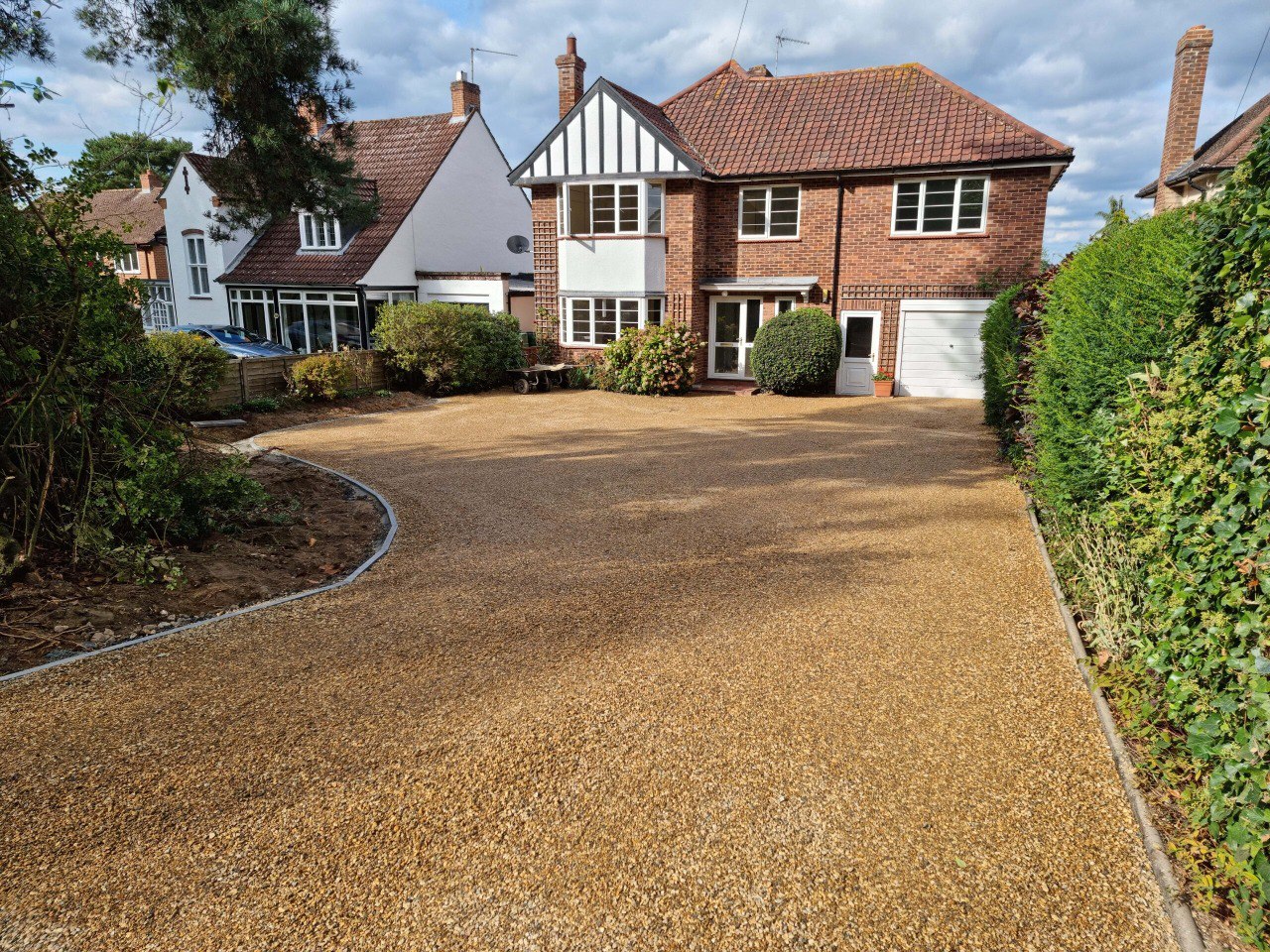This is a newly installed tar and chip driveway installed by Kempston Driveways